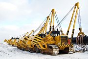 Супергерой: трубоукладчик Komatsu