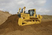 Вывод карьерного бульдозера Komatsu из парка. Как правильно расчитать время