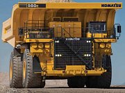 Карьерный самосвал 980Е-4 – титан Komatsu с горой руды в кузове